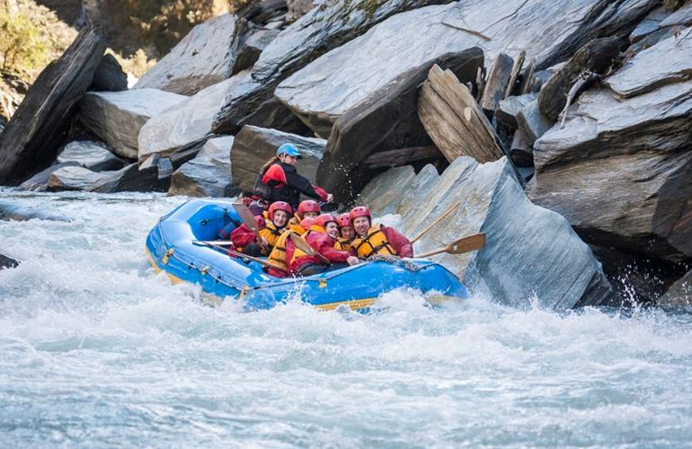 Whitewater river rafting in Shotover river in Queenstown.