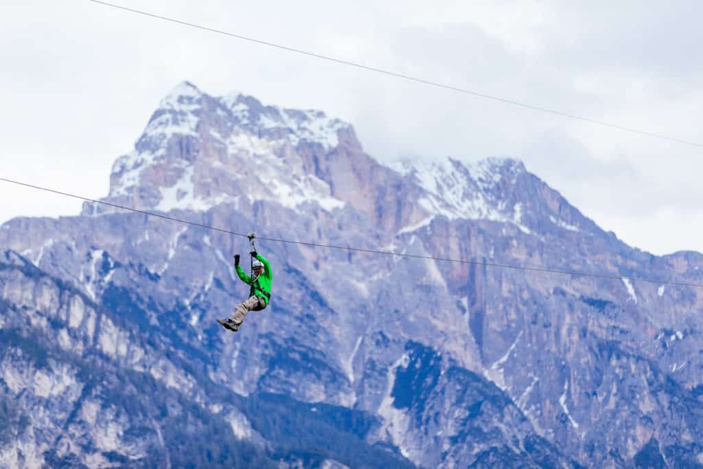 Zip lining in the mountains of San Vigilio near Konplatz