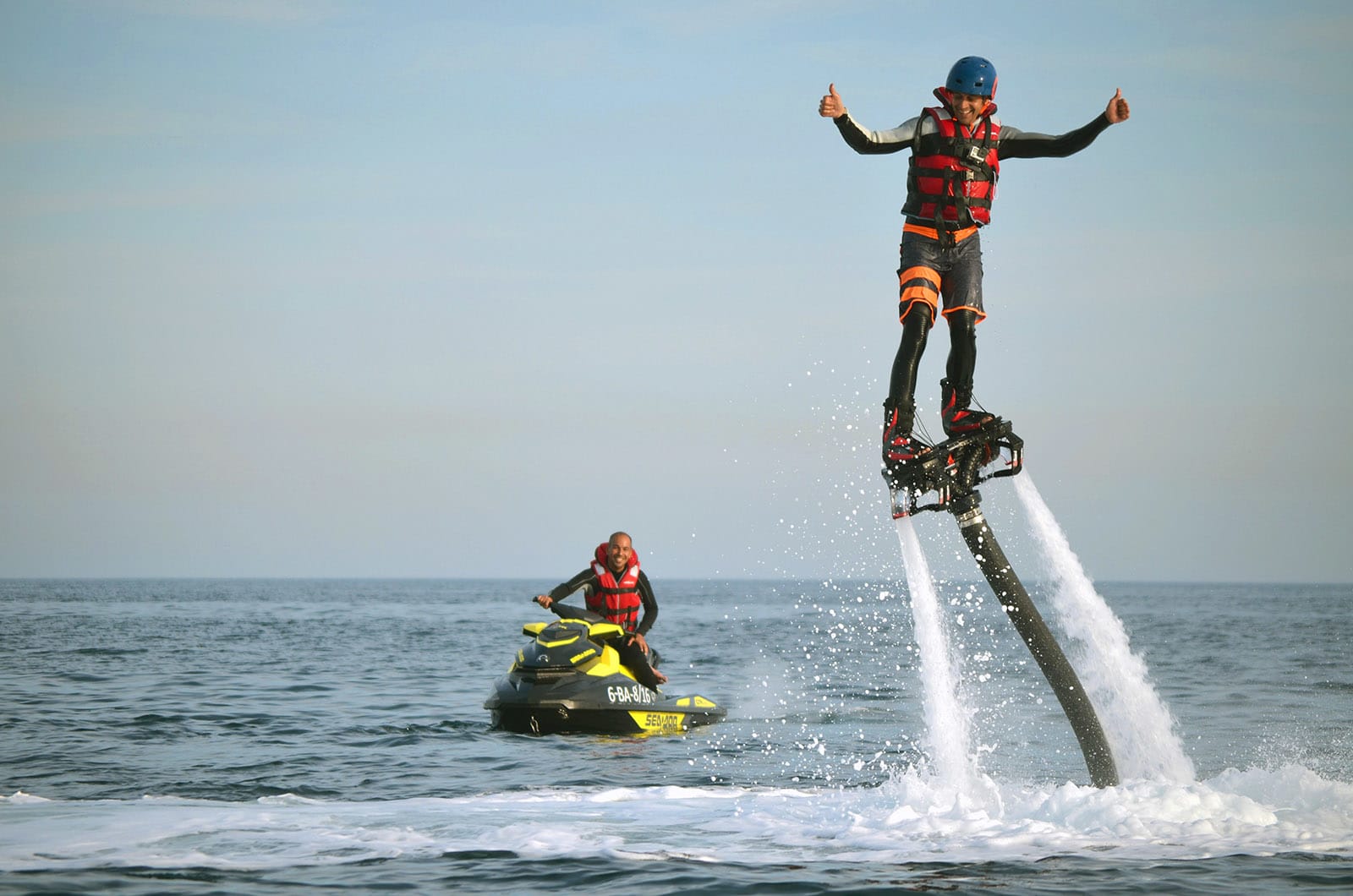 Person practising flyboarding and Jetski in Barcelona