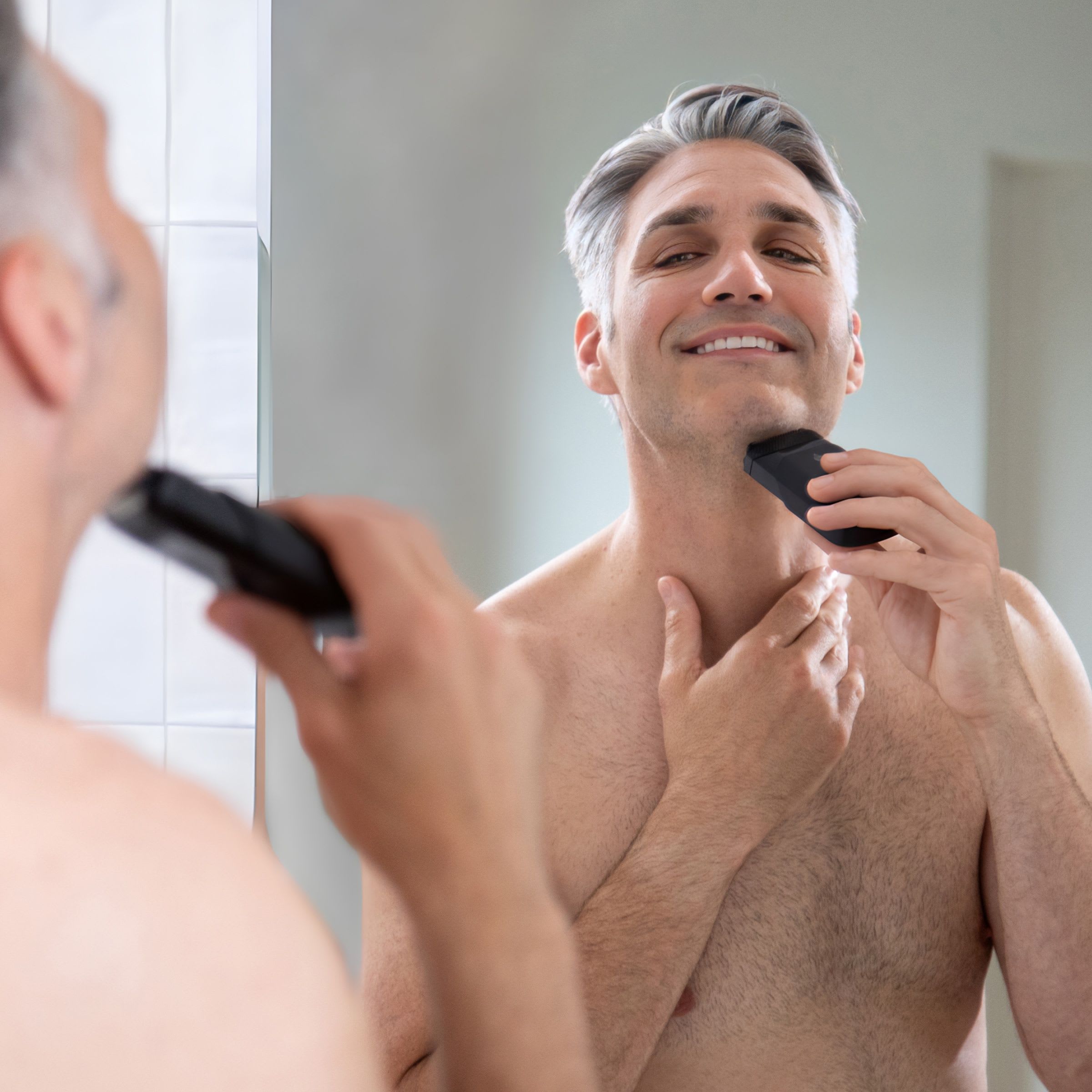 The Handyman foil shaver being used to trim a male models beard