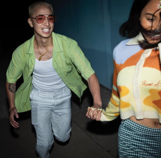 Girl and Guy running together smiling