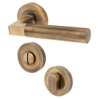 Hampstead Antique Solid Brass Knurled Door Handles on Rose with Turn & Release