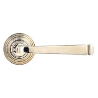 From The Anvil Polished Nickel Door Handles on Round Beehive Rose - Avon Range