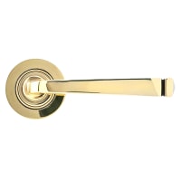 From The Anvil Aged Brass Door Handles on Round Rose - Avon Range
