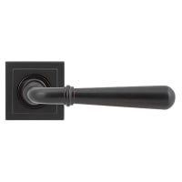 From The Anvil Aged Bronze Door Handles on Square Rose - Newbury Range
