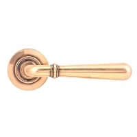From The Anvil Polished Bronze Door Handles on Round Screw On Rose - Newbury Range