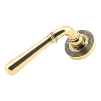 From The Anvil Aged Brass Door Handles on Round Beehive Rose - Newbury Range