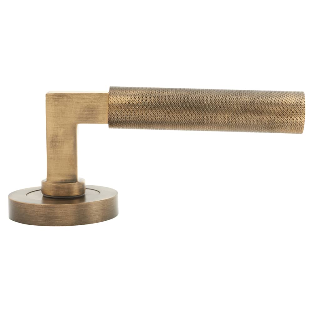Hampstead Solid Brass Knurled Lever Door Handle on Rose Antique Brass IronmongeryDirect