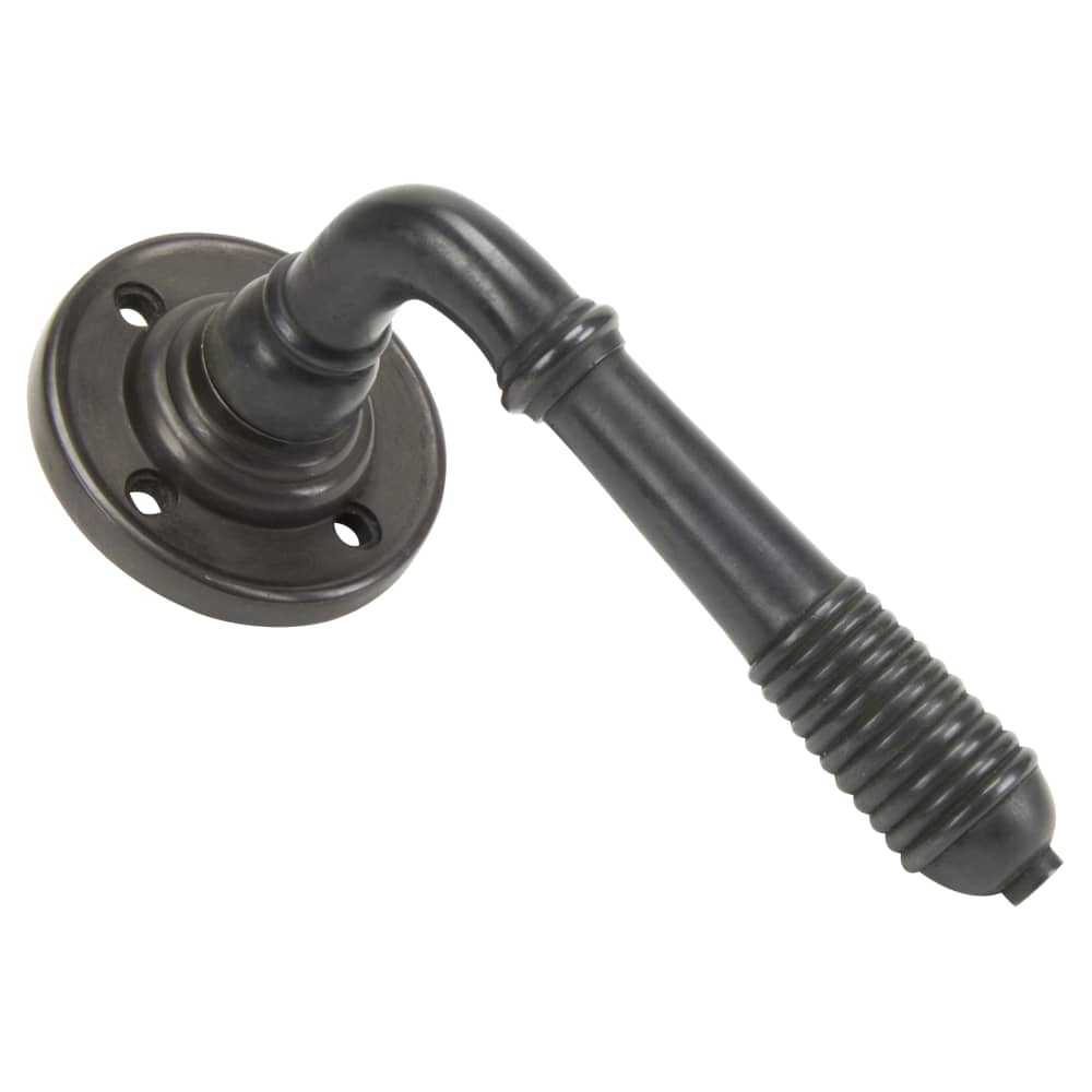 From The Anvil Reeded Beehive Door Handle on Rose - Aged Bronze