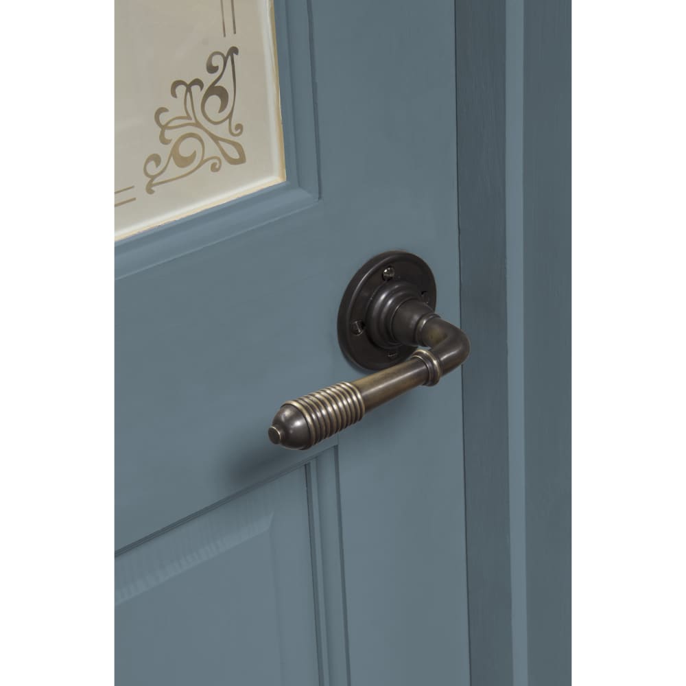 From The Anvil Reeded Beehive Door Handle on Rose - Aged Bronze