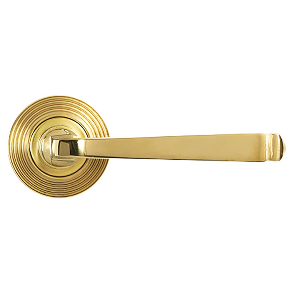 From The Anvil Avon Door Handle on Reeded Beehive Rose - Polished Brass