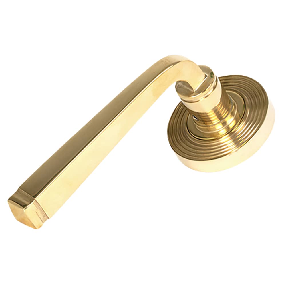 From The Anvil Avon Door Handle on Reeded Beehive Rose - Polished Brass