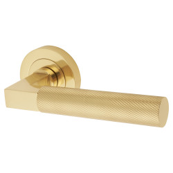 Hampstead Polished Brass Knurled Door Handles on Round Rose
