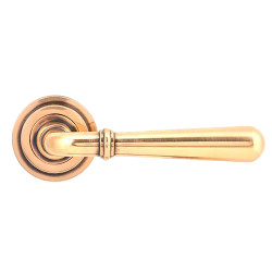From The Anvil Polished Bronze Door Handles on Round Art Deco Rose - Newbury Range