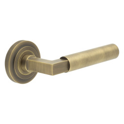 Burlington by Frelan Antique Brass Fire Rated Door Handles on Round Stepped Rose - Westminster Range
