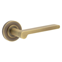 Burlington by Frelan Antique Brass Fire Rated Door Handles on Round Rose - Fitzrovia Range