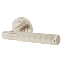 Altro Satin Nickel Lines Door Handles on Round Rose - Nova Range