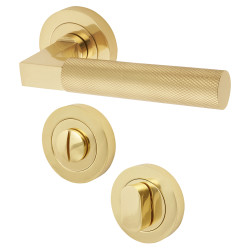 Hampstead Polished Solid Brass Knurled Door Handles on Rose with Turn & Release
