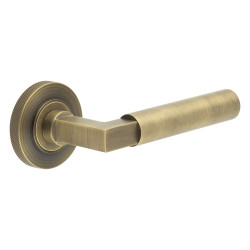 Burlington by Frelan Antique Brass Fire Rated Door Handles on Round Knurled Rose - Westminster Range