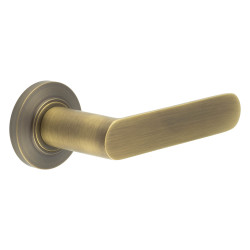 Burlington by Frelan Antique Brass Fire Rated Door Handles on Round Chamfered Rose - Kensington Range