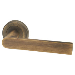 Serozzetta by Carlisle Brass Antique Brass Door Handles on Round Rose - Edge Range