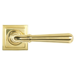 From The Anvil Polished Brass Door Handles on Square Rose - Newbury Range