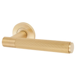Alexander and Wilks Satin Brass Reeded Door Handles on Round Rose - Spitfire Range