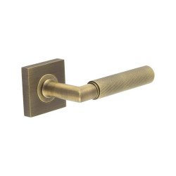 Burlington by Frelan Antique Brass Knurled Fire Rated Door Handles on Square Rose - Piccadilly Range