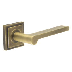 Burlington by Frelan Antique Brass Fire Rated Door Handles on Square Stepped Rose - Fitzrovia Range