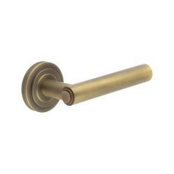 Burlington by Frelan Antique Brass Fire Rated Door Handles on Round Stepped Rose - Richmond Range