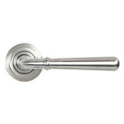 From The Anvil Satin Stainless Steel Door Handles on Round Art Deco Rose - Newbury Range
