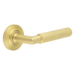 Burlington by Frelan Satin Brass Knurled Fire Rated Door Handles on Round Chamfered Rose - Piccadilly Range