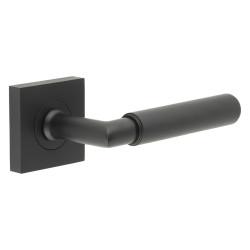 Burlington by Frelan Matt Black Knurled Fire Rated Door Handles on Square Rose - Piccadilly Range