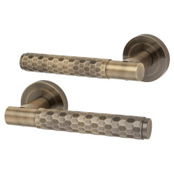 Altro Antique Brass Honeycomb Door Handles on Round Rose - Cara Range