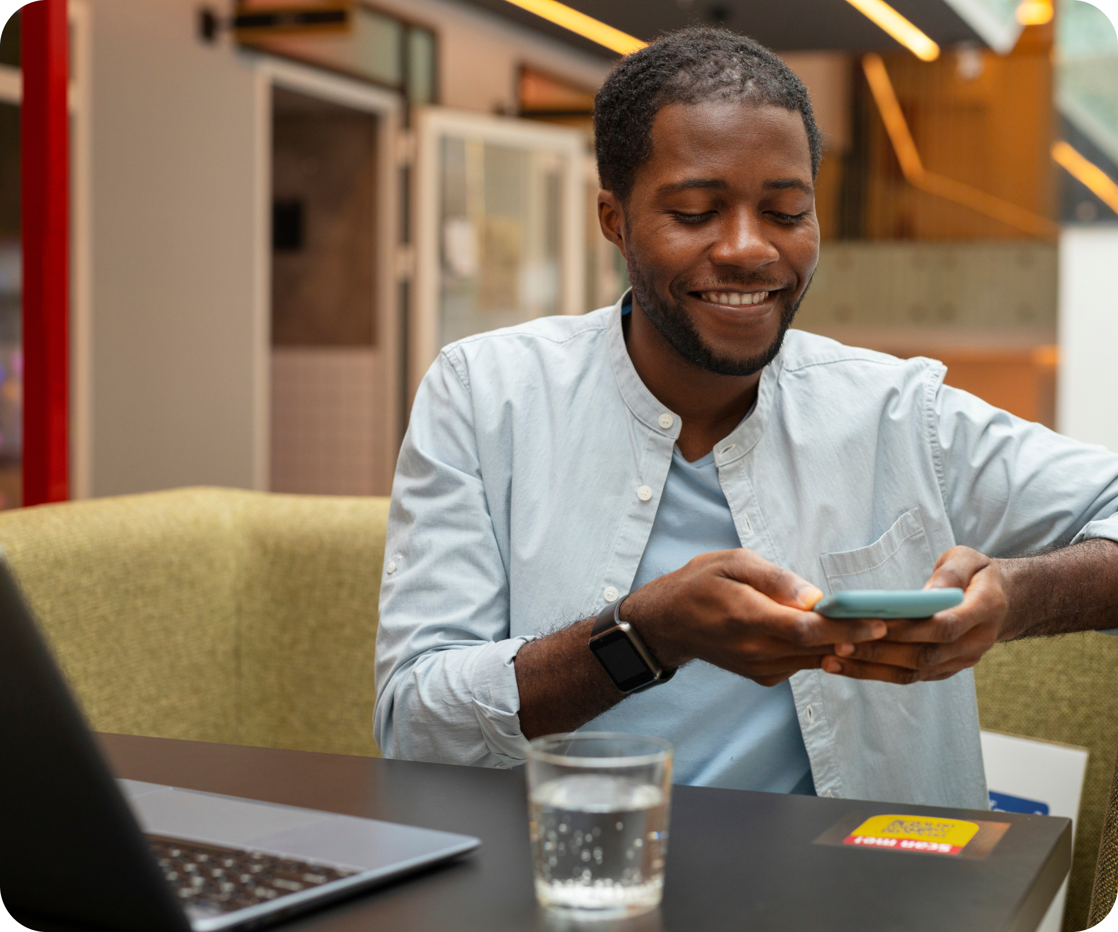 Black lady holding a point of sale, receiving payment