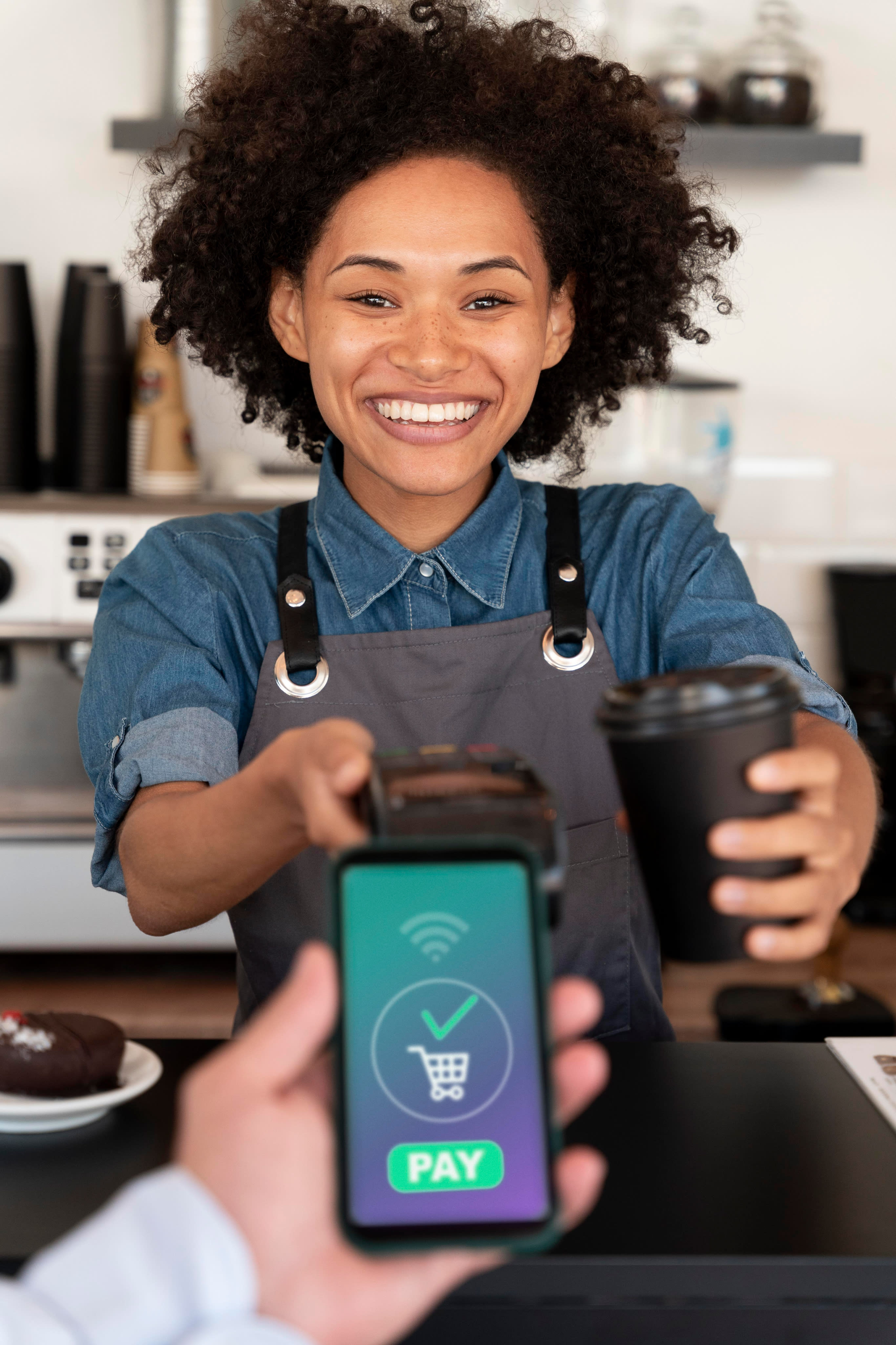 Black lady looking into laptop