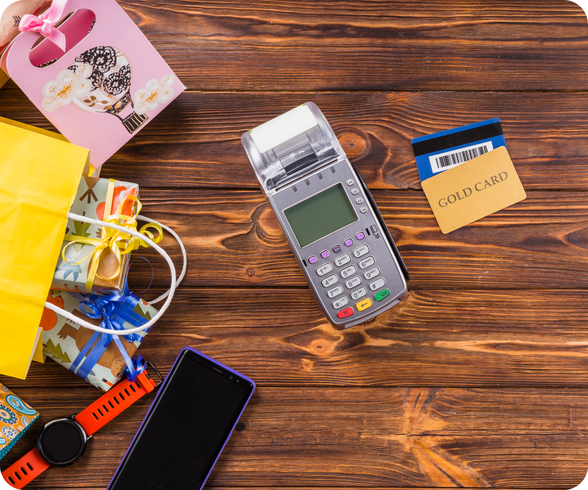 Black lady holding a point of sale, receiving payment