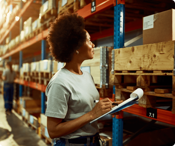 Black lady holding a point of sale, receiving payment