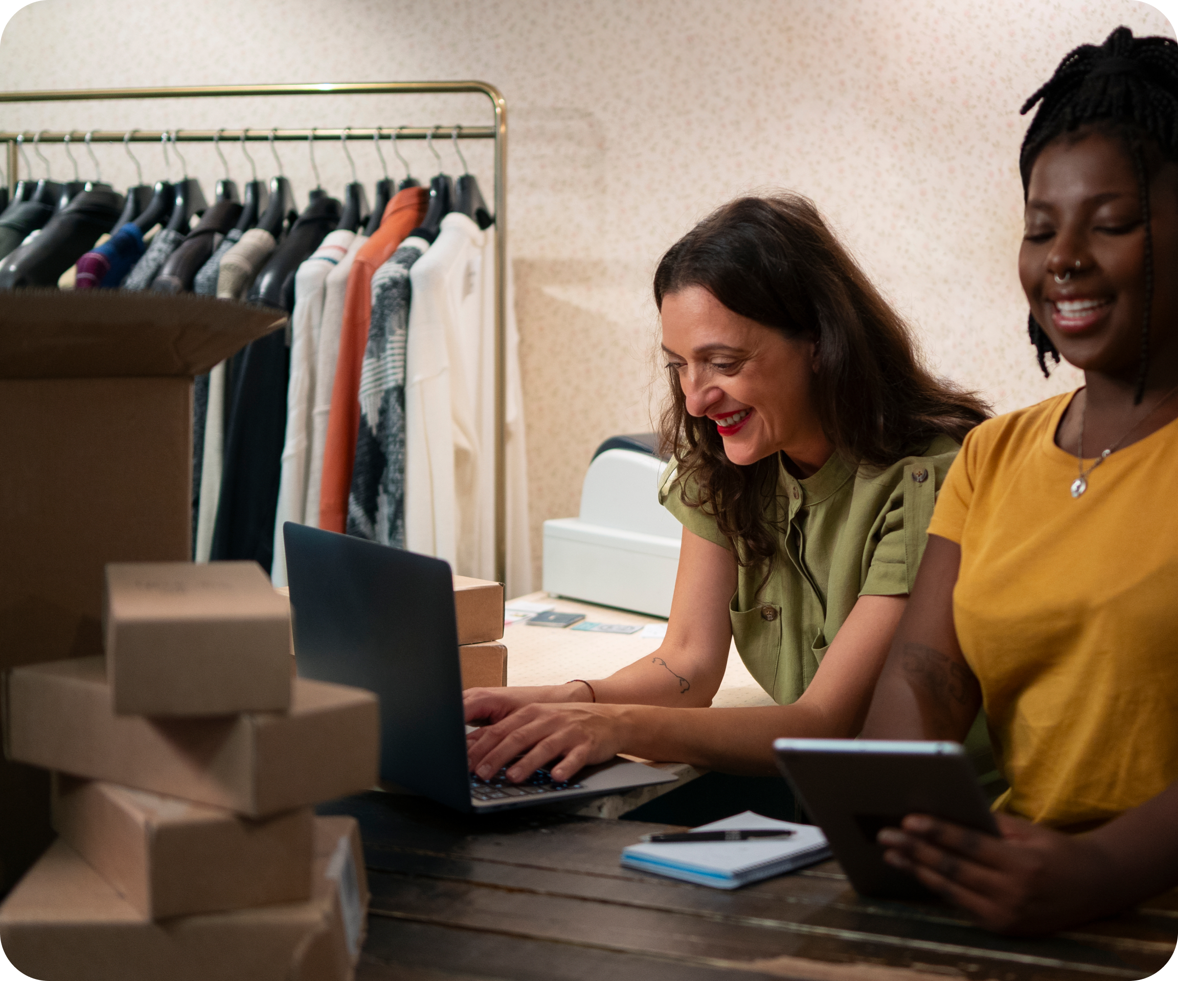 Black lady holding a point of sale, receiving payment