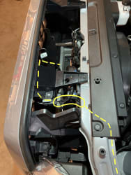 Under the hood and at the top of the grille, I highlight the location of the kit’s wires via a drawn-on yellow line.