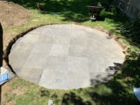 The hole, completely covered with interlocking rubber mats