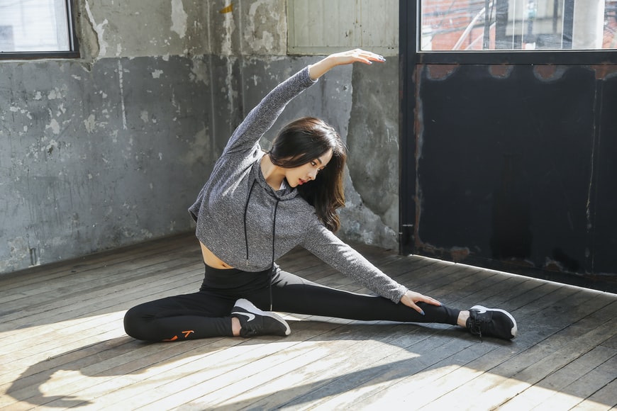 A woman stretching the leg