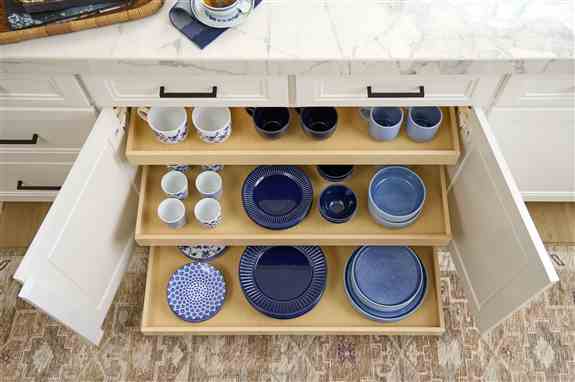 Double height shelves are the perfect solution for larger items such as pots, cleaning supplies, and counter top appliances.