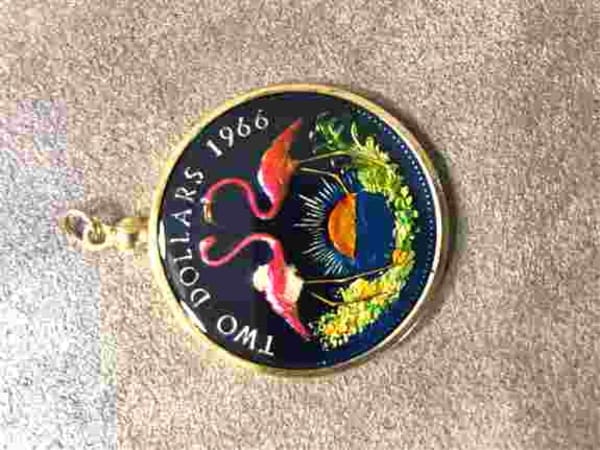 Hand-painted Bahama Two Dollar Coin.  I use enamel paint, fire it in a kiln to bond paint to the coin and seal it with an acrylic to prevent chipping, scratching or fading.