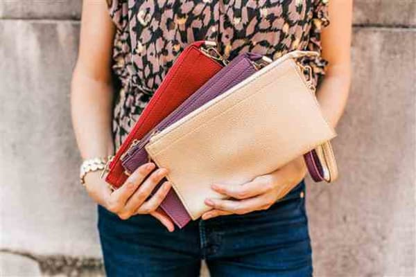 The Abby Crossbody - Wear as a clutch, wristlet, or crossbody handbag!  The Abby is the medium size bag of the 3 crossbody's carried in the boutique.