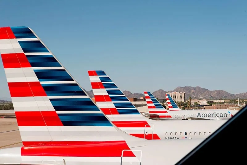 Airlines Say Masks Might Become a Must When Taking to the Skies: Business Casual
