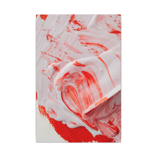 Vibrant red and white paint swirls create an abstract composition.