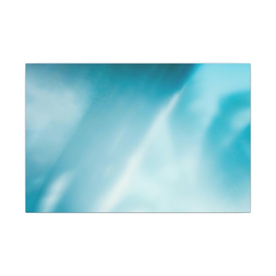 A bright, abstract composition with blue and white hues creating a dreamy, defocused effect.