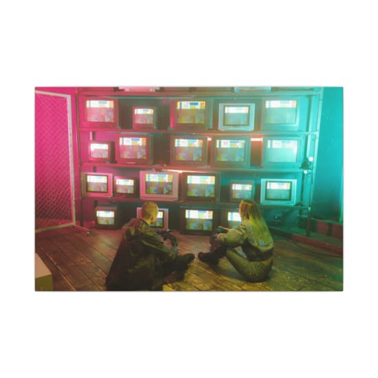 A cyberpunk inspired setting featuring two people with retro TVs displaying colorful test screens.