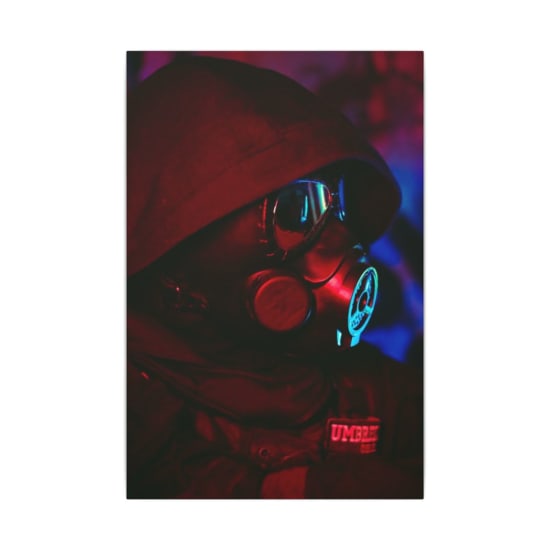 Atmospheric shot of a person wearing a gas mask under moody red and blue lighting.